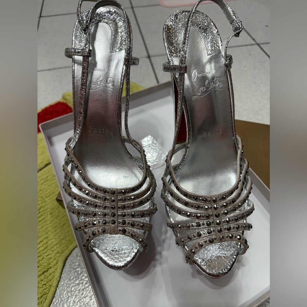 Christian Louboutin - Vegastrassima Alta platform sandals
by Christian Louboutin